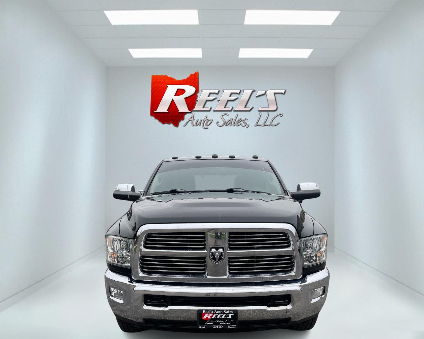 2012 Black /Black Dodge Ram 2500 Laramie Crew Cab SWB 4WD (3C6TD5FT6CG) with an 5.7L V8 OHV 16V engine, 6-Speed Automatic transmission, located at 547 E. Main St., Orwell, OH, 44076, (440) 437-5893, 41.535435, -80.847855 - This 2012 Dodge Ram 2500 Laramie Crew Cab is a heavy-duty pickup truck designed for serious towing and hauling capabilities. Powered by a 5.7L HEMI V8 engine mated to a 6-speed automatic transmission and 3.73 gearing, it boasts an impressive 10,550-pound towing capacity. The interior is well-appoint - Photo#1